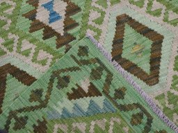 Surface texture of New Modern Design rug with natural Wool and intricate pattern