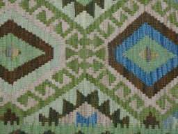 Backside of handmade New Modern Design rug showing knot structure and weave density