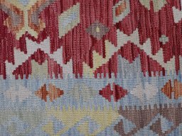 Backside of handmade New Modern Design rug showing knot structure and weave density