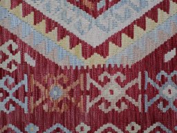 Backside of handmade New Modern Design rug showing knot structure and weave density