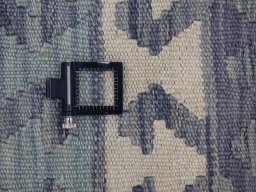 Corner detail of New Modern Design rug showing border pattern and Wool pile