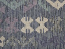 Backside of handmade New Modern Design rug showing knot structure and weave density