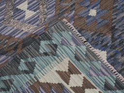Surface texture of New Modern Design rug with natural Wool and intricate pattern