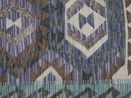 Backside of handmade New Modern Design rug showing knot structure and weave density