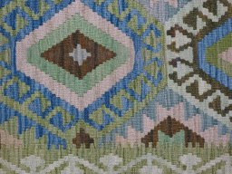 Backside of handmade New Modern Design rug showing knot structure and weave density