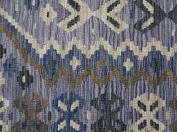 Backside of handmade New Modern Design rug showing knot structure and weave density