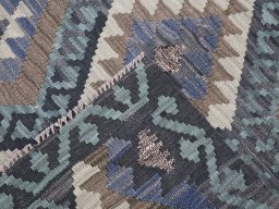 Surface texture of New Modern Design rug with natural Wool and intricate pattern