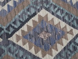 Central medallion detail of New Modern Design rug from Pakistan
