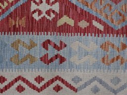 Backside of handmade New Modern Design rug showing knot structure and weave density