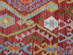 Backside of handmade New Modern Design rug showing knot structure and weave density