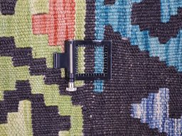 Corner detail of New Modern Design rug showing border pattern and Wool pile