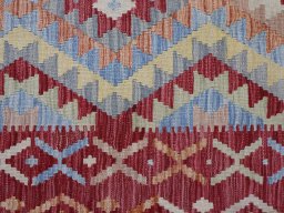 Backside of handmade New Modern Design rug showing knot structure and weave density