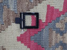Corner detail of New Modern Design rug showing border pattern and Wool pile