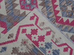 Surface texture of New Modern Design rug with natural Wool and intricate pattern