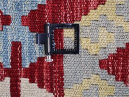 Corner detail of New Modern Design rug showing border pattern and Wool pile