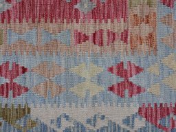Backside of handmade New Modern Design rug showing knot structure and weave density