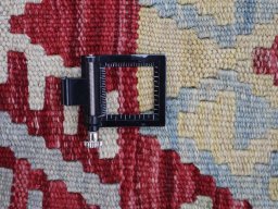 Corner detail of New Modern Design rug showing border pattern and Wool pile