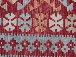 Backside of handmade New Modern Design rug showing knot structure and weave density