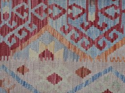 Backside of handmade New Modern Design rug showing knot structure and weave density