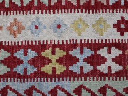 Backside of handmade New Modern Design rug showing knot structure and weave density