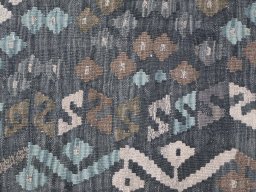 Backside of handmade New Modern Design rug showing knot structure and weave density