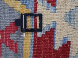 Corner detail of New Modern Design rug showing border pattern and Wool pile