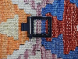 Corner detail of New Modern Design rug showing border pattern and Wool pile