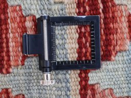 Corner detail of New Modern Design rug showing border pattern and Wool pile