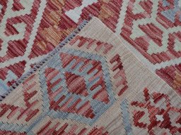 Surface texture of New Modern Design rug with natural Wool and intricate pattern