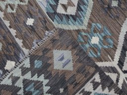 Surface texture of New Modern Design rug with natural Wool and intricate pattern