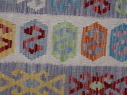 Backside of handmade New Modern Design rug showing knot structure and weave density