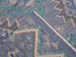 Surface texture of New Modern Design rug with natural Wool and intricate pattern