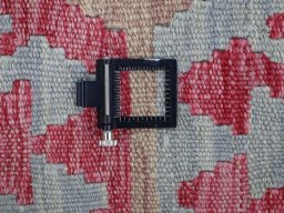 Corner detail of New Modern Design rug showing border pattern and Wool pile