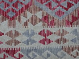 Backside of handmade New Modern Design rug showing knot structure and weave density