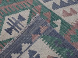 Surface texture of New Modern Design rug with natural Wool and intricate pattern