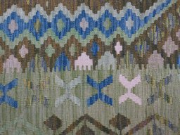 Backside of handmade New Modern Design rug showing knot structure and weave density