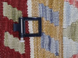 Corner detail of New Modern Design rug showing border pattern and Wool pile