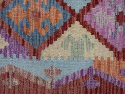 Backside of handmade New Modern Design rug showing knot structure and weave density