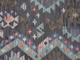 Backside of handmade New Modern Design rug showing knot structure and weave density