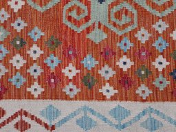 Backside of handmade New Modern Design rug showing knot structure and weave density
