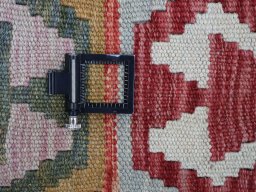 Corner detail of New Modern Design rug showing border pattern and Wool pile