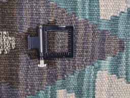 Corner detail of New Modern Design rug showing border pattern and Wool pile