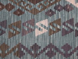 Backside of handmade New Modern Design rug showing knot structure and weave density