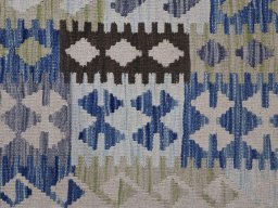 Backside of handmade New Modern Design rug showing knot structure and weave density