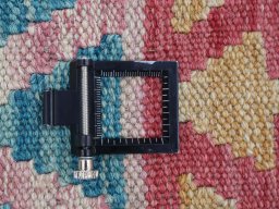 Corner detail of New Modern Design rug showing border pattern and Wool pile