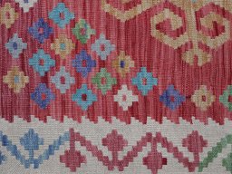 Backside of handmade New Modern Design rug showing knot structure and weave density