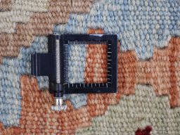 Corner detail of New Modern Design rug showing border pattern and Wool pile