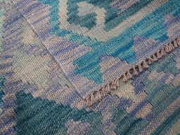 Surface texture of New Modern Design rug with natural Wool and intricate pattern