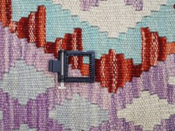 Corner detail of New Modern Design rug showing border pattern and Wool pile
