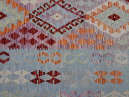 Backside of handmade New Modern Design rug showing knot structure and weave density